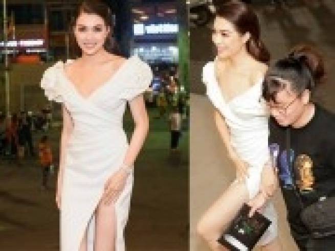 &Aacute; hậu Lệ Hằng vất vả che chắn v&igrave; diện v&aacute;y xẻ đ&ugrave;i t&aacute;o bạo